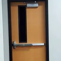 A door with the handle on it and a window.